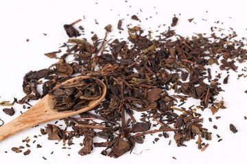 Tea leaves on a spoon.