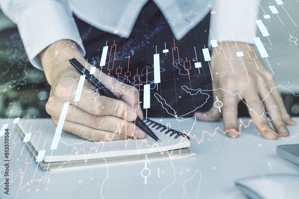 Poster multi exposure of abstract creative financial chart with world map and with hand writing in notebook