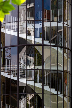 The white semicircular staircase of the Ofms building