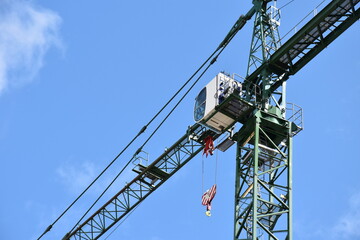 Closeup of a construction crane against the blue sky
