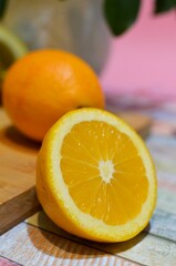 Vertical shot of orange cut in a half
