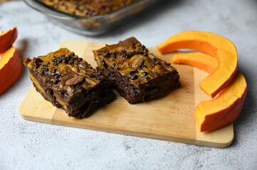 Closeup of Kurbis Brownies with slices of pumpkins