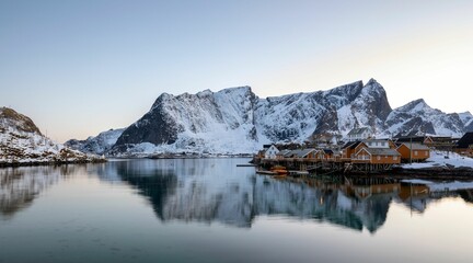 Obraz premium Resort in scenic winter mountains with lake