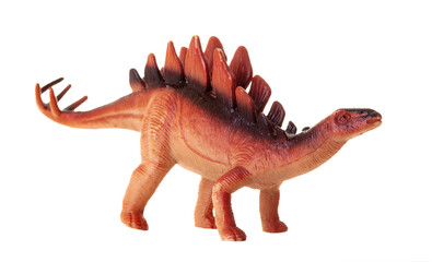 Realistic plastic model of a Stegosaurus dinosaur on white background.