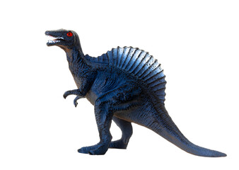 Obraz premium Detailed plastic toy model of a blue spinosaurus dinosaur against a white backdrop