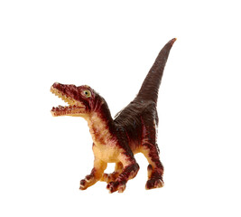 Detailed toy replica of a velociraptor dinosaur isolated on a white background
