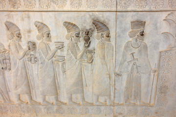 Bas reliefs that depict delegations from across the Persian empire bringing tribute to the...