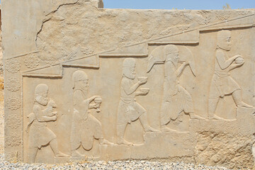Bas reliefs that depict delegations from across the Persian empire bringing tribute to the Achaemenid kings in Persepolis, Iran