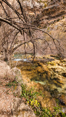 Majestic Gorges and Blossoming Banks: Reveling in the Magnificence of Pitarque River's Birthplace in Fortanete, Teruel, Amidst the Renewal of Springtime.
