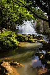 Obraz premium Vertical shot of the waterfall in the nature