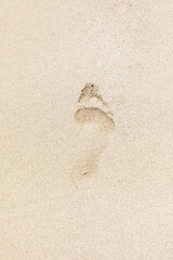 background of footprint at the fine beach sand