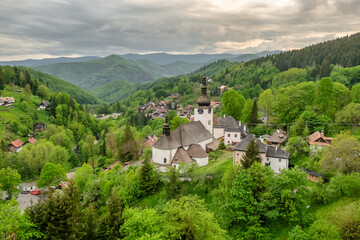 Aerial view of an old christian church in Spania Dolina village, Slovakia. © Mazur Travel