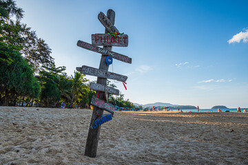 Makeshift directional signpost on Karon beach in Phuket, Thailand
