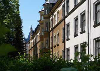 Low angle view of buildings against blue sky