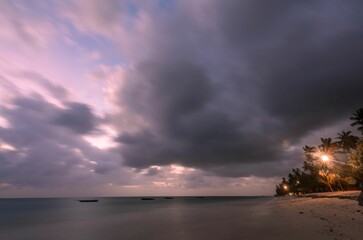Mesmerizing view of a boat on the beach at sunset