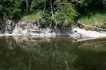 Calm river with reflections