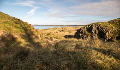 Obraz premium sand dunes and sea in the sun