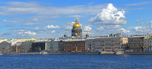 English Embankment and St. Isaac's Cathedral on sunny summwer day in St. Petersburg, Russia