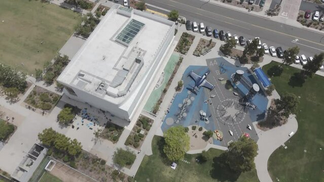 Drone shot of Norma Hertzog Community Center and Lions Park Playground in California on a sunny day