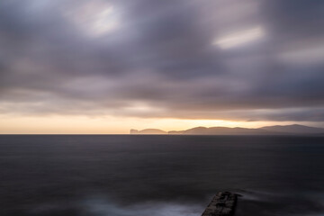 Fototapeta premium Sunset from the old town of Alghero, Sardinia, Italy
