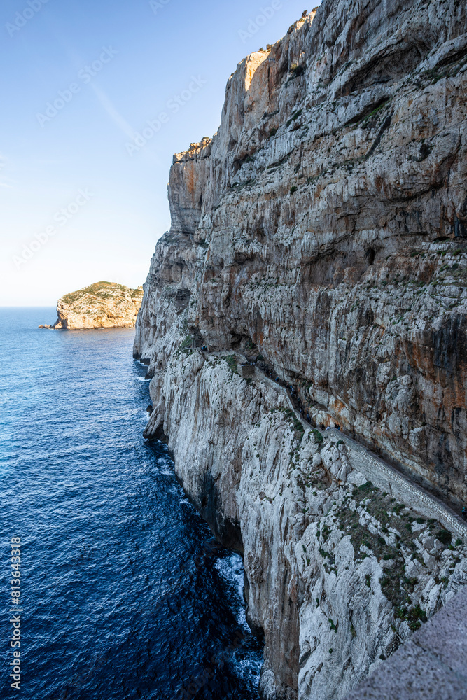 Poster escala of cabirol, a long stairs that goes to neptune caves in sardinia.