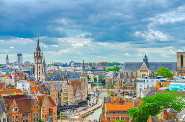 Obraz premium Ghent cityscape, aerial panoramic view of Ghent historical city centre with old traditional buildings, Gent skyline horizon, panorama of Gent old town, East Flanders province, Flemish region, Belgium