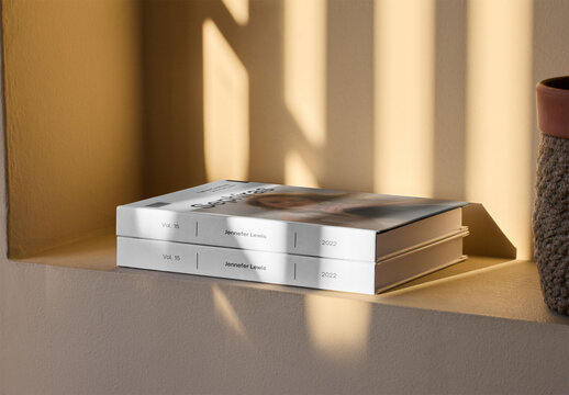Mockup of two customizable books lying on shelf