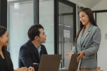 employees are discussing and exchange their idea to solve some miner problem, group of entrepreneurs is planning strategy to increase their income in the office, happy working