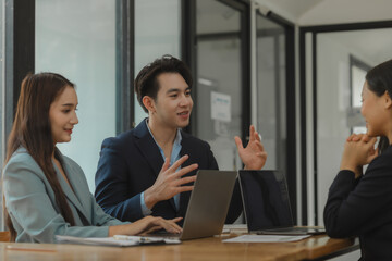 working together in workplace, exchange an idea to each other with a team for more perspective of how to do work well, a group of businesspeople is planning about new project