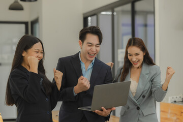 folks of businesspeople smiled with satisfaction because of they achieved their goal which is signing a contract with a major client, sharing the happiness from business success