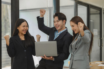 folks of businesspeople smiled with satisfaction because of they achieved their goal which is signing a contract with a major client, sharing the happiness from business success