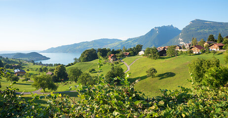 tourist resort Krattigen, summer landscape Bernese Oberland, view to lake Thunersee