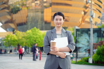 Confident Young Professional Woman in Urban Setting