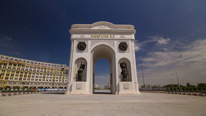 Fototapeta premium Triumphal arch timelapse and the central part of the city in Astana, Kazakhstan.