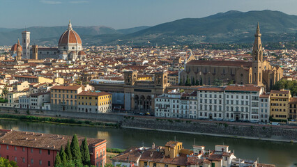 Fototapeta premium Florence aerial cityscape view timelapse from Michelangelo square on the old town with Santa Croce church in Italy