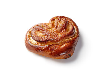 Sugar-dusted sweet bun filled with custard on white background