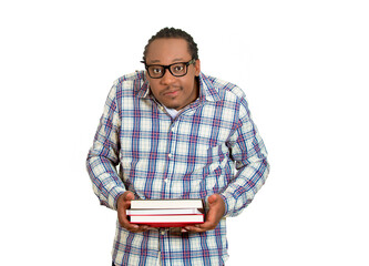 Portrait of a nerdy funny looking guy with books 