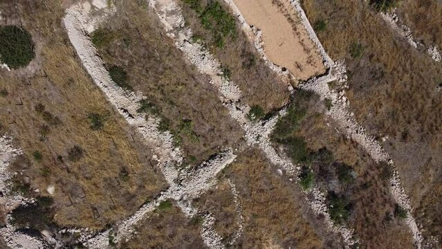 Agricultural fields, terraced land, malta,Aerial view. Revealing Mistra bay, st pauls island, Qawra and Buggiba in the distance, Mediterranean Sea. High quality 4k footage