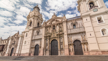 Fototapeta premium The Basilica Cathedral of Lima is a Roman Catholic cathedral located in the Plaza Mayor timelapse hyperlapse in Lima, Peru