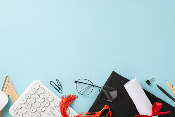 A minimalist setup for a graduation theme with a diploma, tassel, glasses, and calculator on a...
