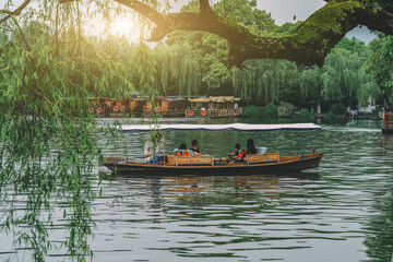 Peaceful Sunset Boat Ride in a Serene Park Lake