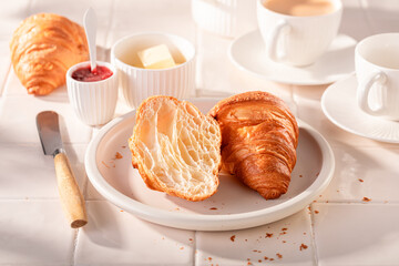 Hot and golden french croissants for breakfast.