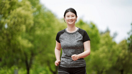 Active Woman Enjoying a Healthy Jog in the Park