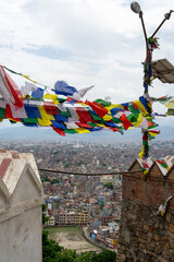 The mountain people of Nepal erected long poles at the village entrance or rice fields and hung five-colored cloth with scriptures written on them to pray for their well-being.