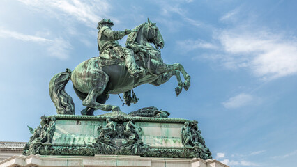Equestrian statue of Prince Eugene of Savoy timelapse hyperlapse in front of Hofburg palace, Heldenplatz, Vienna, Austria.
