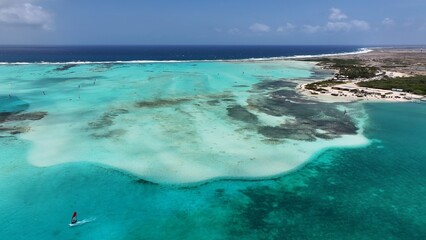 Sorobon Beach At Kralendijk Bonaire Netherlands Antilles. Blue Bay Kralendijk Bonaire. Beach Clouds Sky Shore Sea. Shore International Shore Seaside Panorama Landscape. Shore Sea Ocean Bay Water.