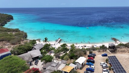 Obraz premium Porto Marie Beach At Willemstad Netherlands Curacao. Blue Sea Willemstad Netherlands. Paradise Island Skyline Season Beauty Background. Paradise Island Sea Season Water Edge Shore.