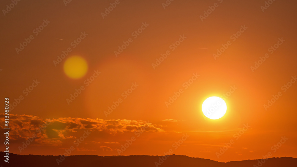 Wall mural Aerial panoramic view of sunset over Vienna city with hills timelapse in Austria.