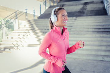 Exercise workout of young woman running for health and fitness across city. Training for better...