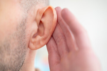 Close-up detail young male ear, poor hearing, Ear Discomfort, Hearing Test, ringing or buzzing...